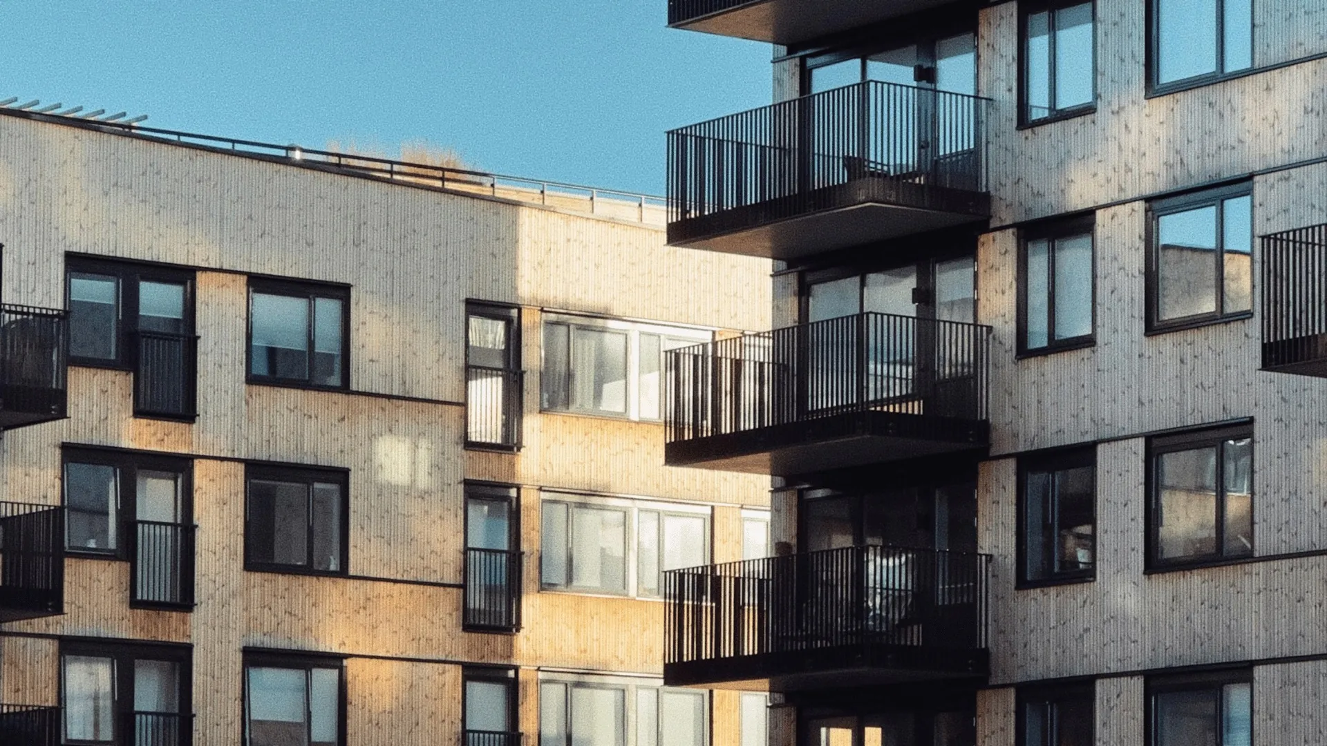 Blinds fitted across a managed apartment interior