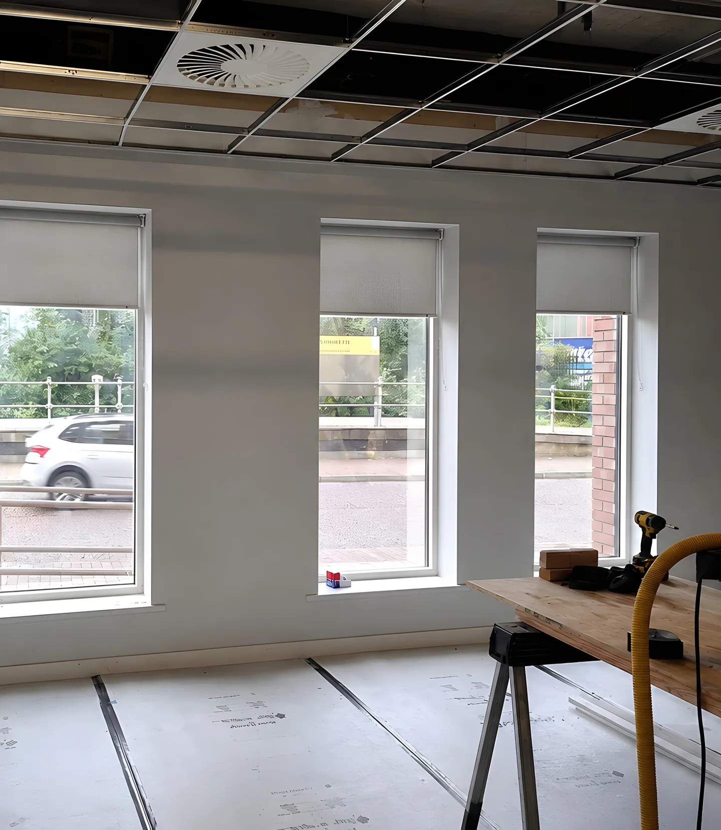 Blackout roller blinds fitted across the DWP office in Salford