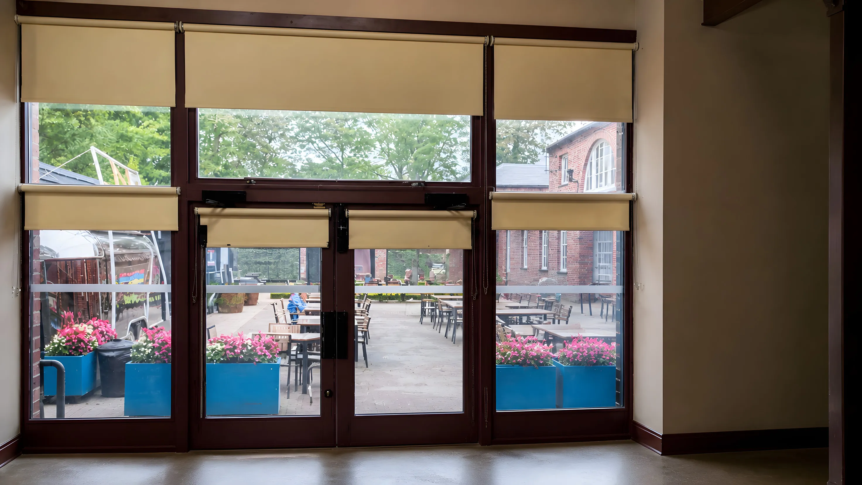 Cream roller blinds fitted at Heaton Park Farm Centre