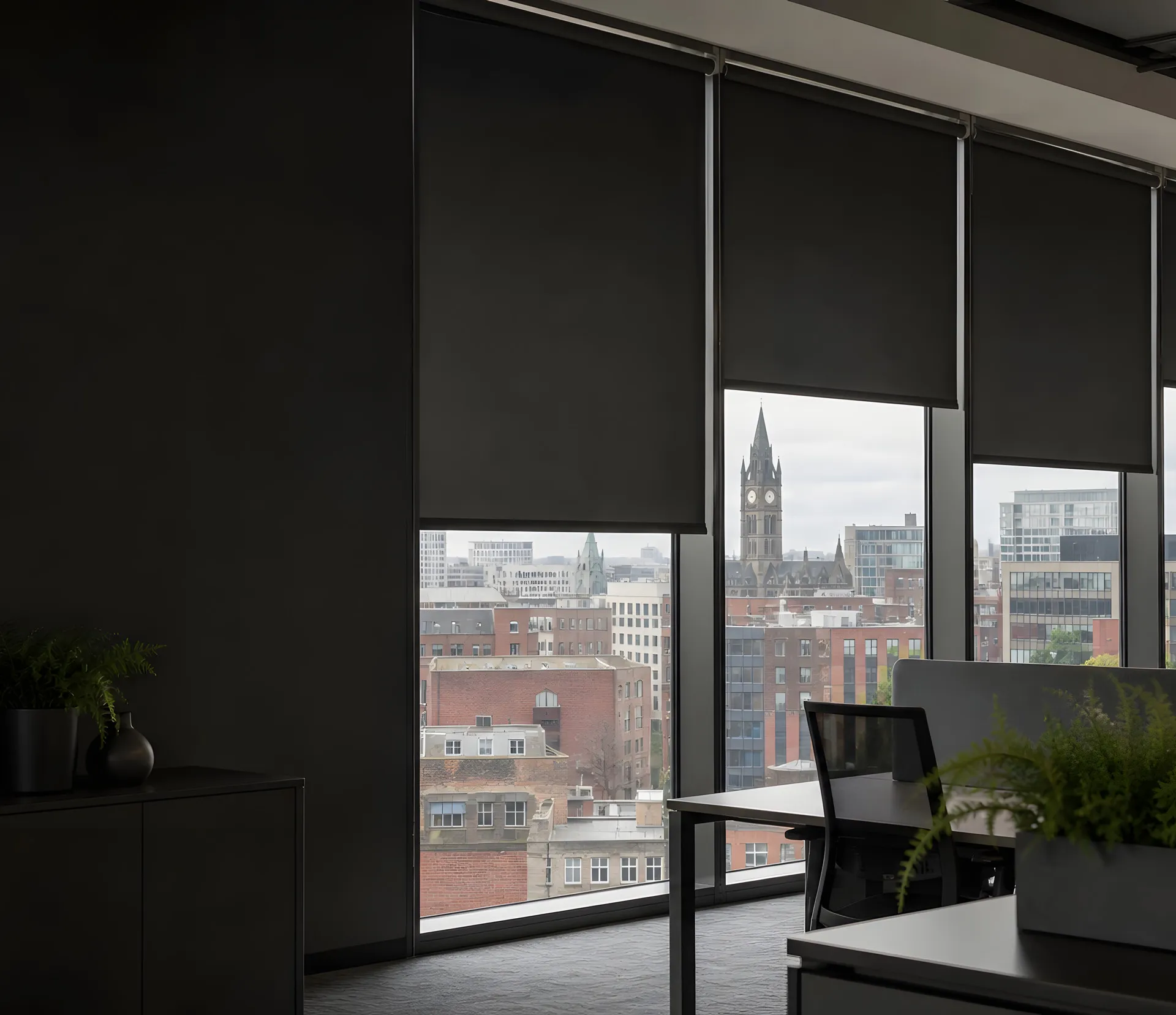 Roller blinds fitted across workplace windows for commercial projects in Merseyside