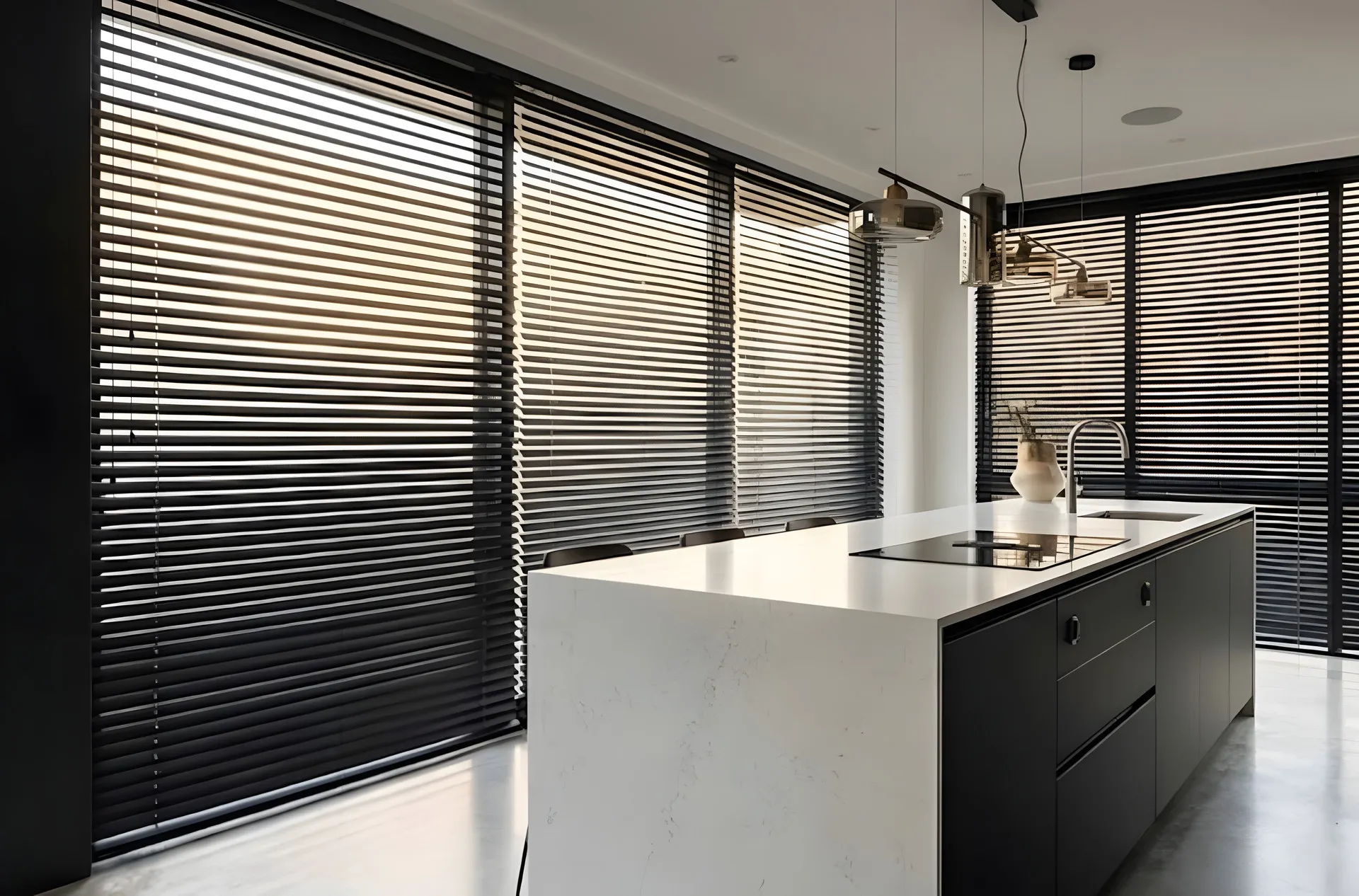 Compact kitchen window fitted with a neat roller blind
