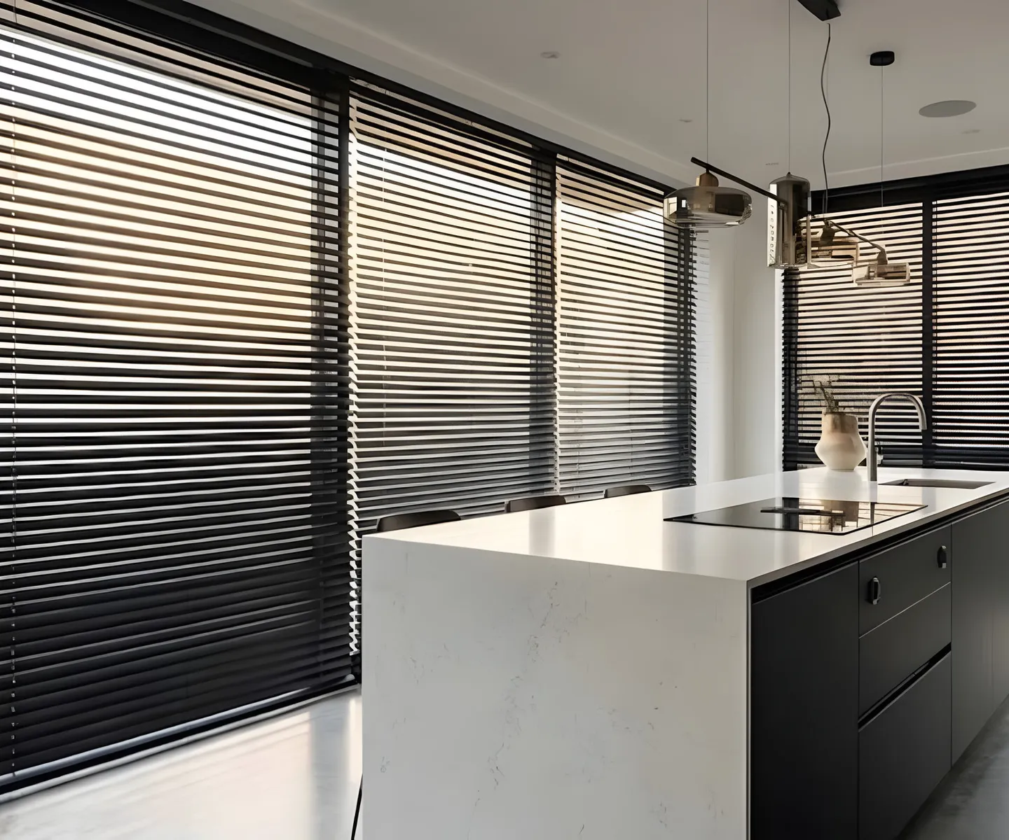 Black Venetian blinds fitted around a kitchen and dining area