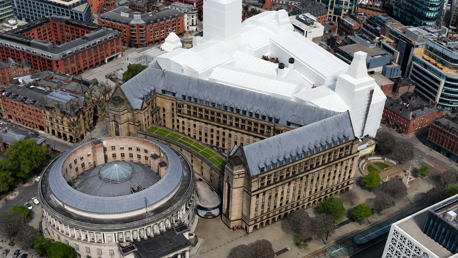 Aerial view across central Manchester and its surrounding districts