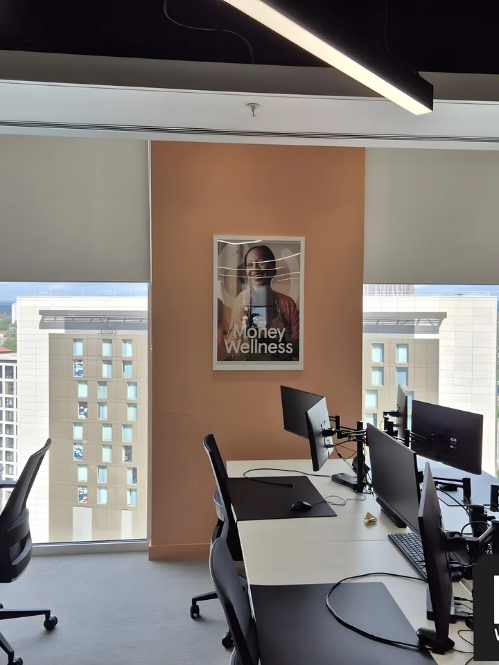 Roller blinds fitted across a modern UK office