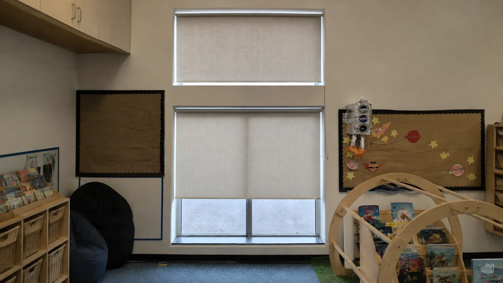 Roller blinds fitted across a North West school learning space