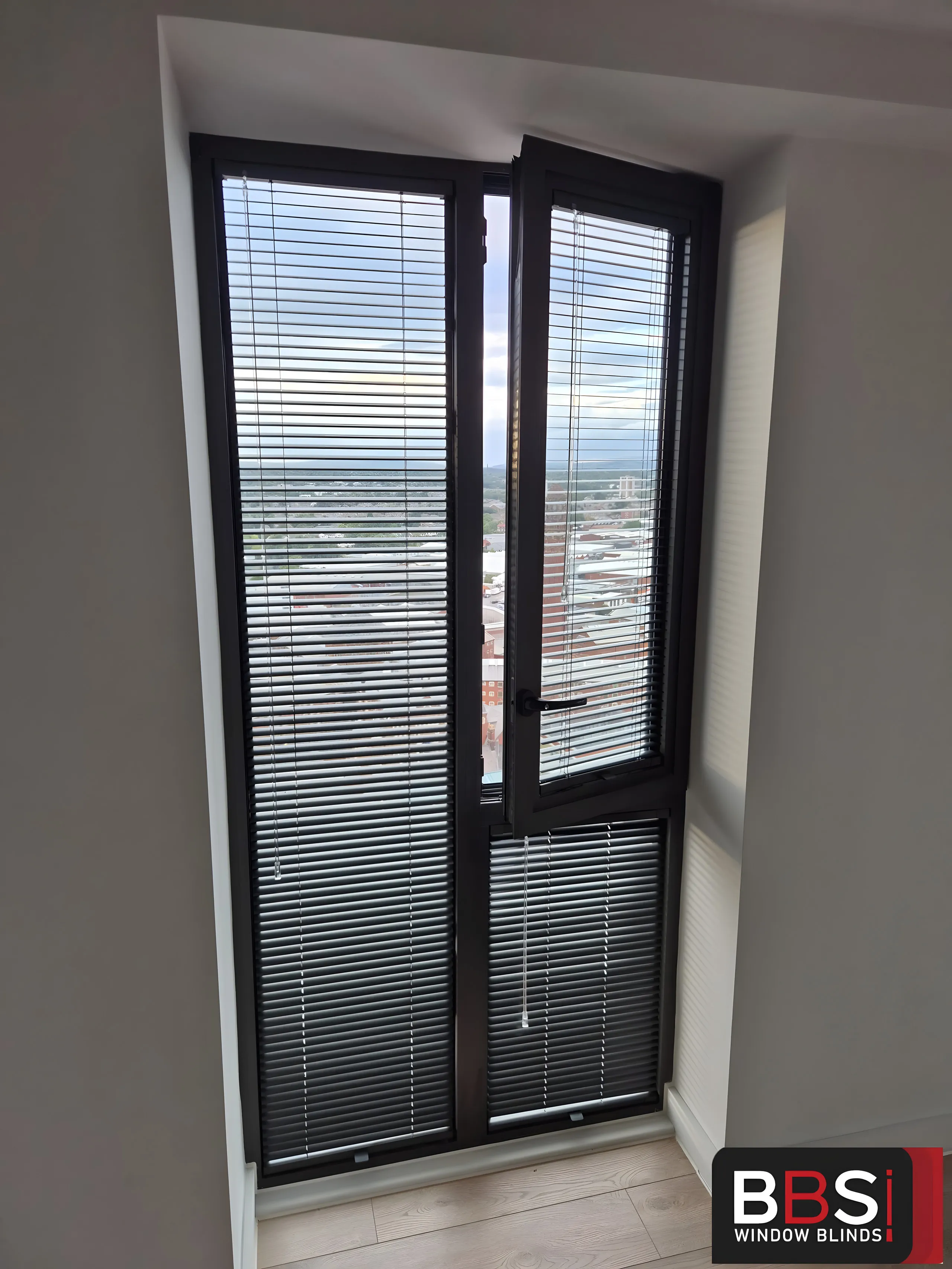 Perfect Fit blind staying on the frame as a tilt-and-turn window swings open