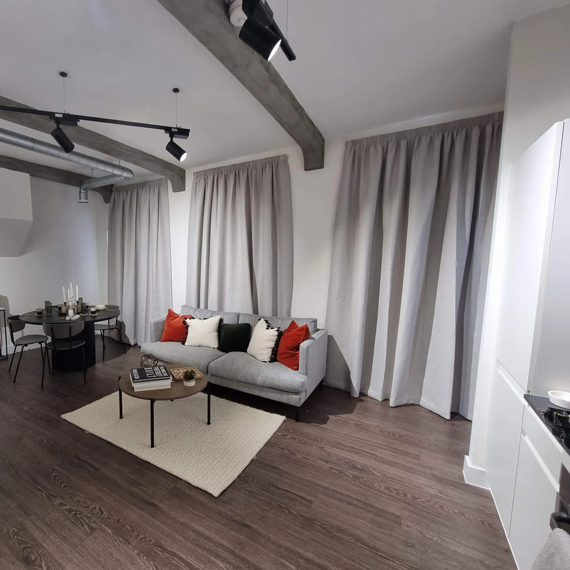 BBS full-length curtains fitted in a private apartment living room