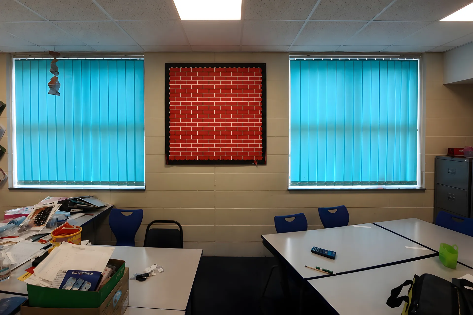 Turquoise vertical blinds fitted during SPIE Facilities school work