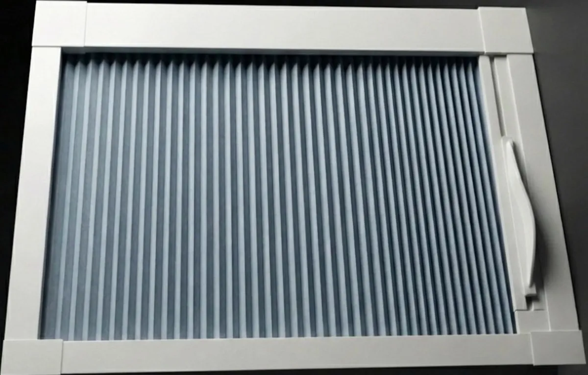 White Blind Screen frame with a pale honeycomb blind and the sliding side handle